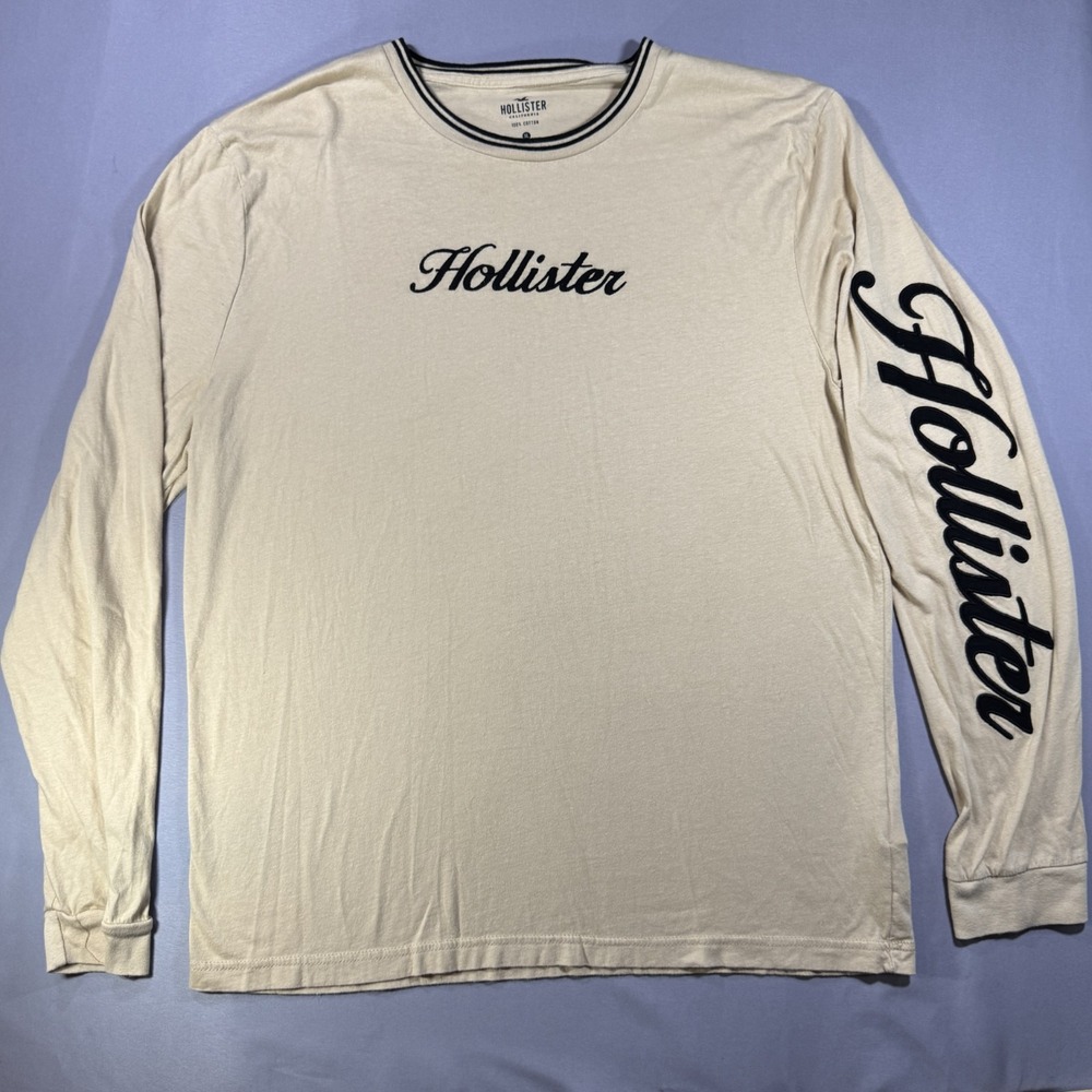 Hollister Mens XL Long Sleeve Graphic T-Shirt Cream Tan Script Logo Ringer Neck